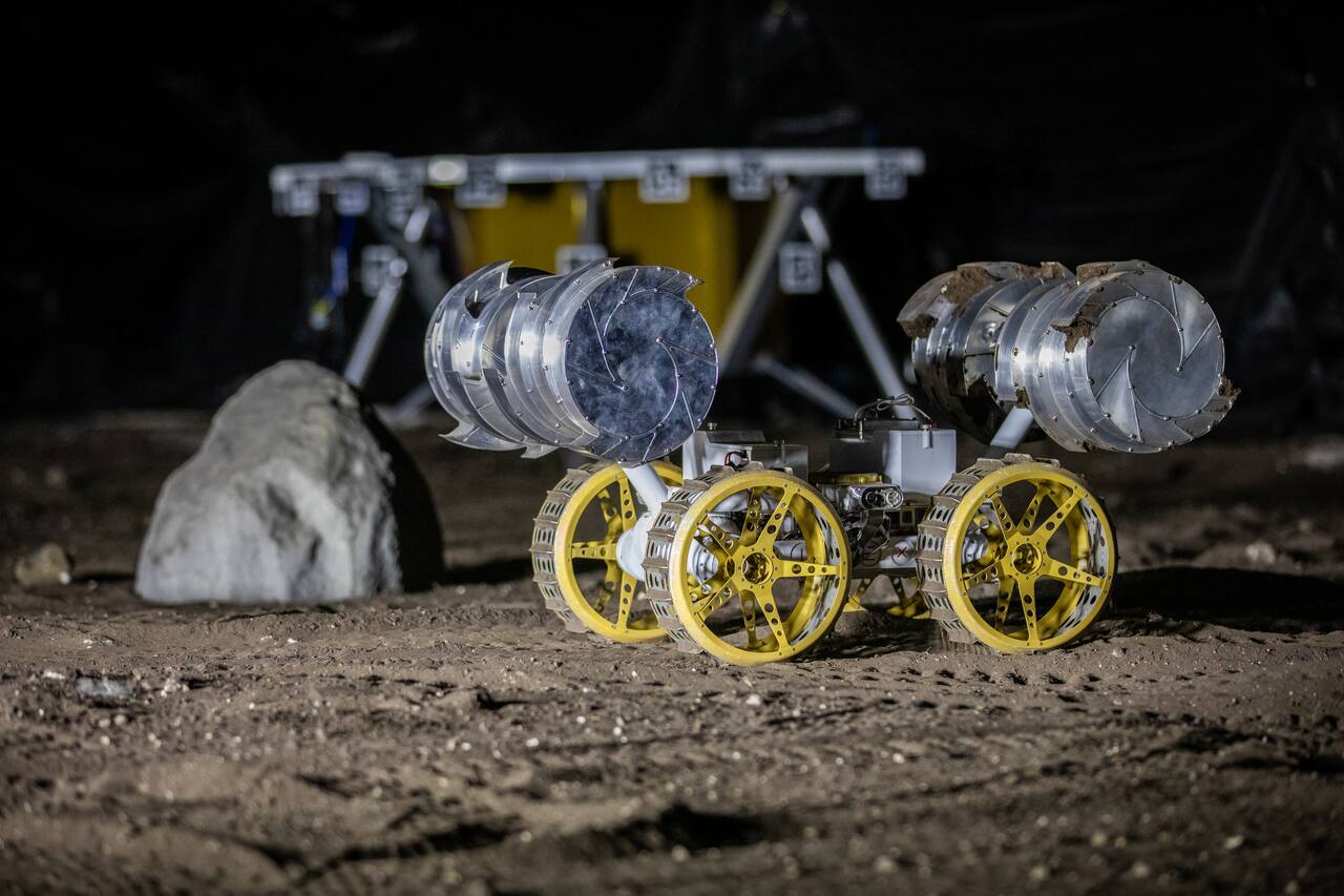 IPEx running a simulated lunar mission in the Kennedy Space Center testbed, 30 August 2024. The bucket drums at each end cut and carry regolith, so the vehicle is both the excavator and the haul truck