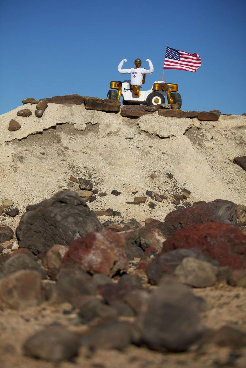 Robonaut 2 on the Centaur 2 wheeled base at the JSC Planetary Analog Test Site, February 2011, on the strewn basaltic rock over crushed limestone that forms the Mars Yard and Lunar Yard surfaces.